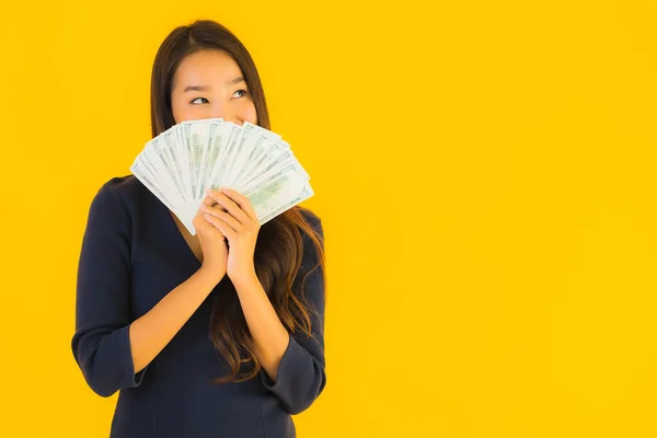 Portrait Beautiful Young Asian Woman Money Cash Yellow Isolated Background — Stock Photo, Image