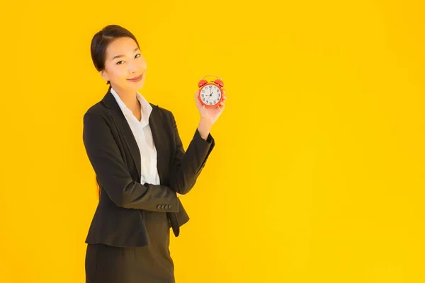 Portrait Beautiful Young Asian Woman Show Time Clock Alarm Yellow — Stock Photo, Image