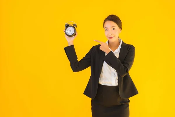 Portrait Beautiful Young Asian Woman Show Time Clock Alarm Yellow — Stock Photo, Image