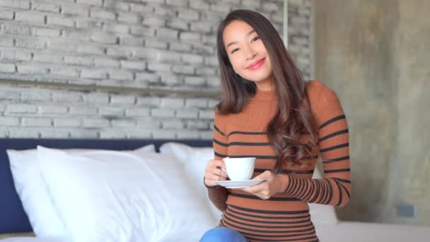Footage Beautiful Asian Woman Relaxing Couch Cup Hot Drink — Stock Video
