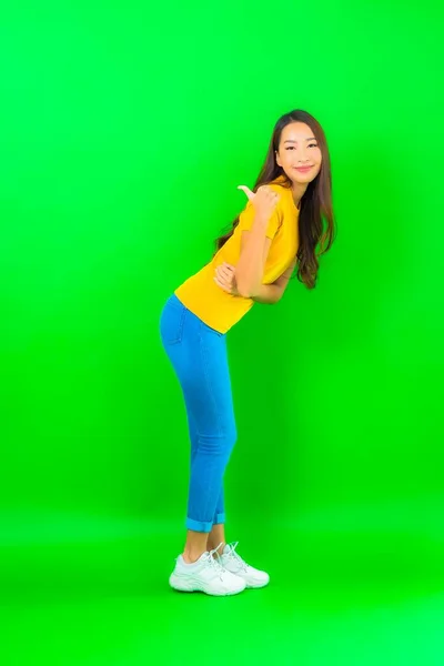 Portrait Beautiful Young Asian Woman Smile Action Green Isolated Background — Stock Photo, Image