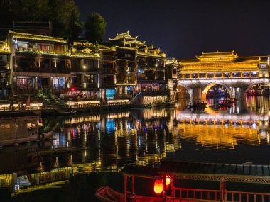 Scenery view of hong bridge in the night of fenghuang old town .phoenix ancient town or Fenghuang County is a county of Hunan Province, China