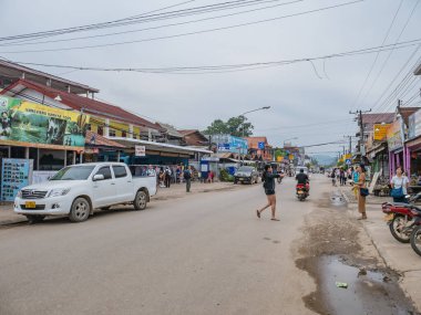 Vangvieng/lao-4 Dec 2017:Unacquainted People or tourist walking on vangvieng street in Lao.Vangvieng City The famous holiday town in Lao.