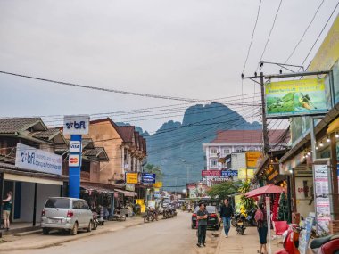 Vangvieng/lao-4 Dec 2017:Unacquainted People walking on vangvieng downtown in Lao.Vangvieng City The famous holiday destination town in Lao.