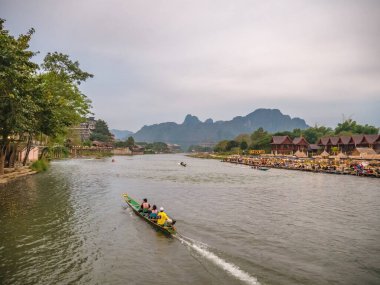 Vangvieng/lao-4 Dec 2017:Unacquainted Tourist Kayaking on Nam Song River in vangvieng Lao.Vangvieng City The famous holiday destination town in Lao.
