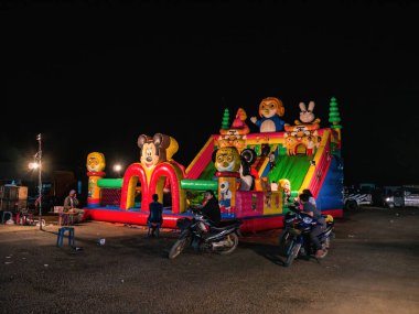 Vangvieng/lao-4 Dec 2017:Bounce House or Childhood Playground at vangvieng night market Lao.Vangvieng City The famous holiday destination town in Lao.