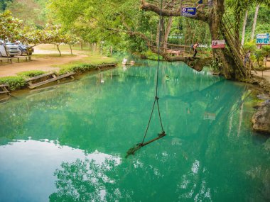 Vangvieng/lao-10 Dec 2017:Tourist with Beautiful nature and clear water of Blue lagoon at pukham cave vangvieng city Lao.Vangvieng City The famous holiday destination town in Lao.