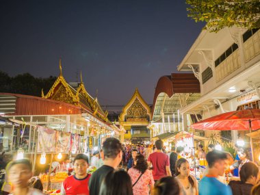 Bangkok/Thailand-24 feb 2019:Unacquainted People and monk in Temple fair of Wat intharam at Bangkok city Thialand