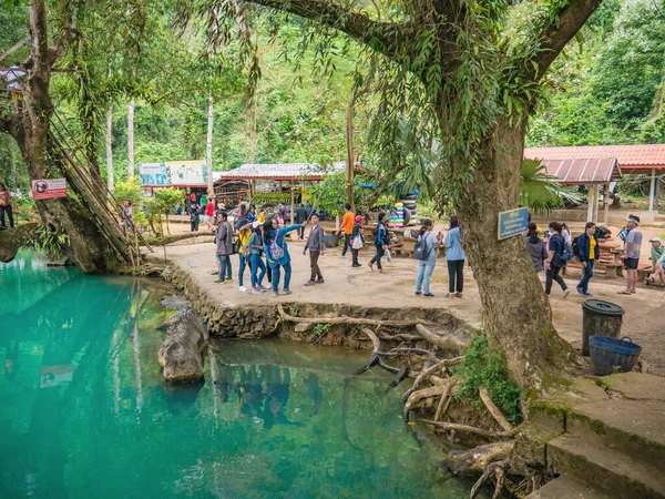 Vangvieng/lao-10 Dec 2017:Tourist with Beautiful nature and clear water of Blue lagoon at pukham cave vangvieng city Lao.Vangvieng City The famous holiday destination town in Lao.