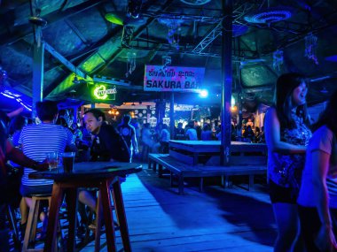Vangvieng/lao-10 Dec 2017:Unacquainted People hangout in Sakura bar at vangvieng City Laos.Vangvieng City The famous holiday destination town in Lao.