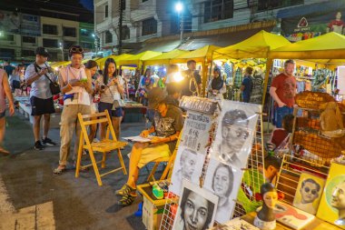 Krabi/Thailand-22 July 2017:Unacquainted Tourist in Krabi city walking street.Krabi - in southern Thailand is one of the most relaxing places on the planet.