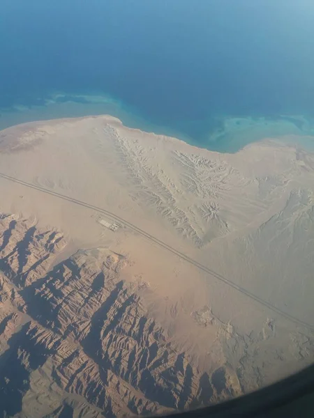 aerial view of the sea and the beach in the mountains