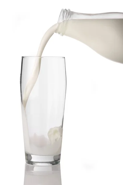 Botella de leche con vidrio —  Fotos de Stock