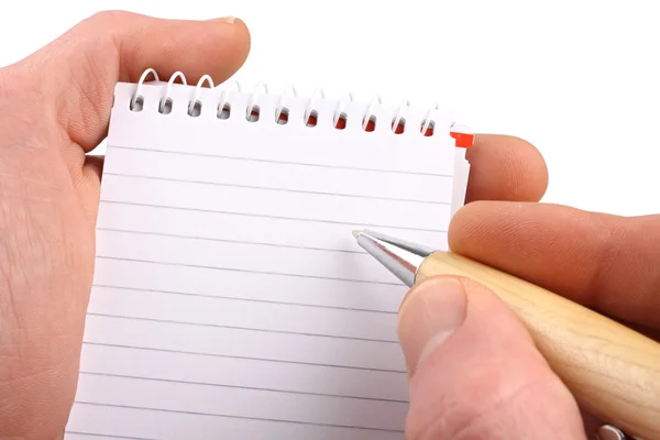 Hand with notepad Royalty Free Stock Photos