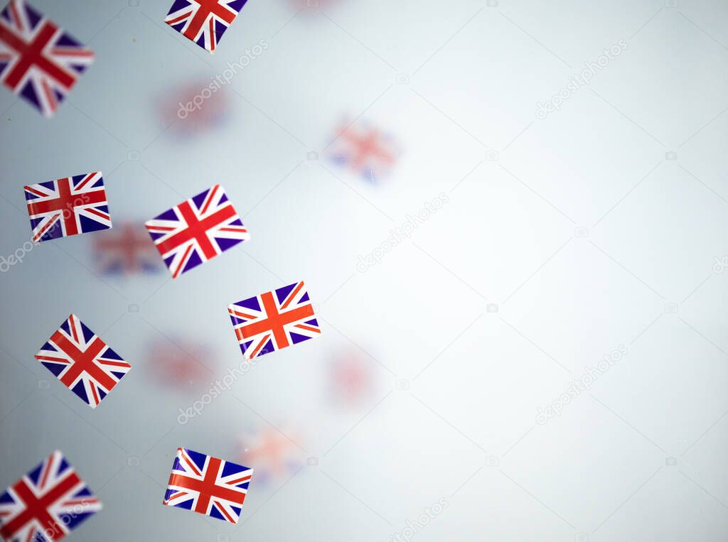 Great Britain, national holiday country. Mini flags on a transparent foggy background. concept patriotism, pride and freedom. Platinum Jubilee of Queen Elizabeth II.