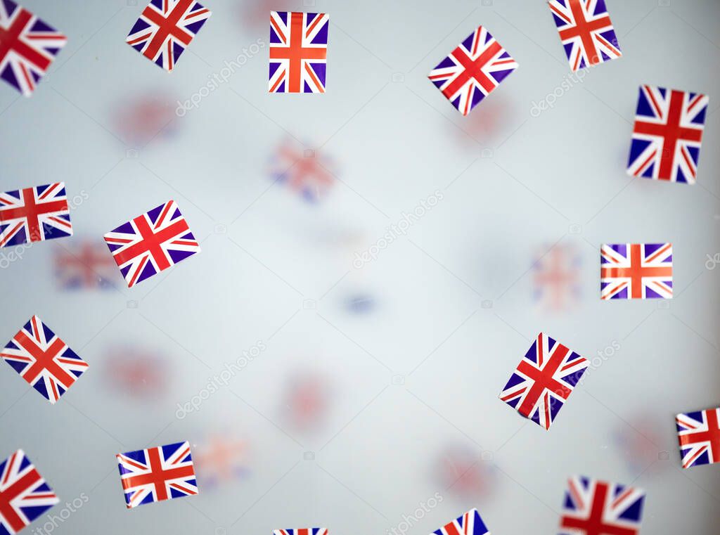 Great Britain, national holiday country. Mini flags on a transparent foggy background. concept patriotism, pride and freedom. Platinum Jubilee of Queen Elizabeth II. High quality photo