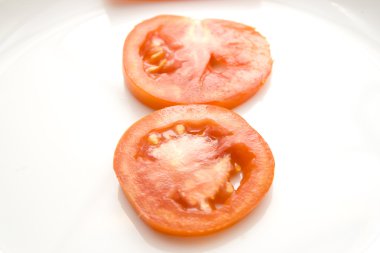Fresh red Tomato on plate