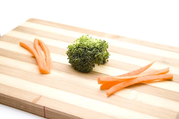 Broccoli with Carrots on Wooden Plate — Stock Photo, Image