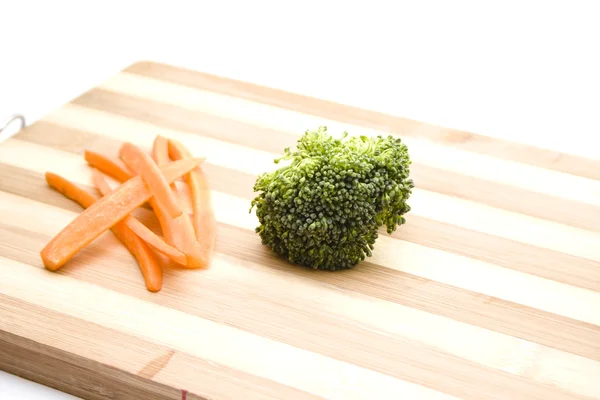 Broccoli with Carrots on Wooden Plate — Stock Photo, Image