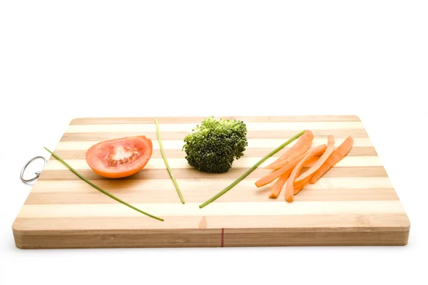 Broccoli med tomat och gräslök — Stockfoto