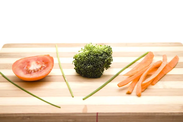 Broccoli med tomat och gräslök — Stockfoto