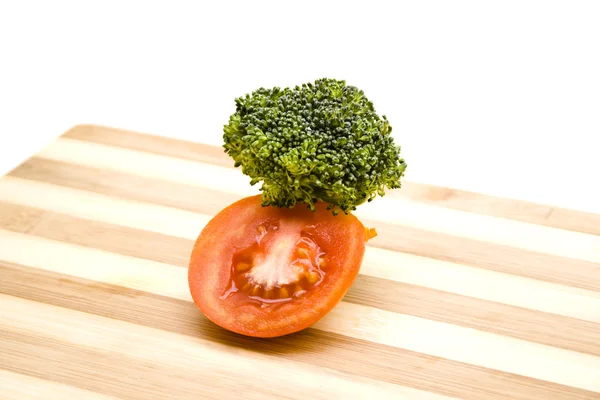 Red Tomatos with Green Broccoli on Wooden Plate — Stock Photo, Image