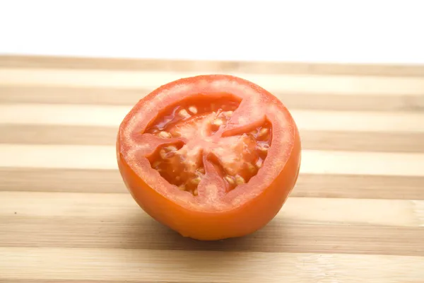 红番茄餐馆木制板上 — 图库照片