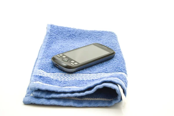 Smartphone on Blue Towel — Stock Photo, Image