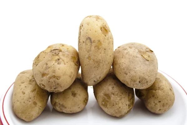 Patatas marrones cocidas en plato —  Fotos de Stock