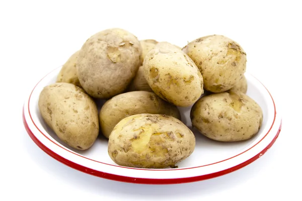 Patatas marrones cocidas en plato —  Fotos de Stock