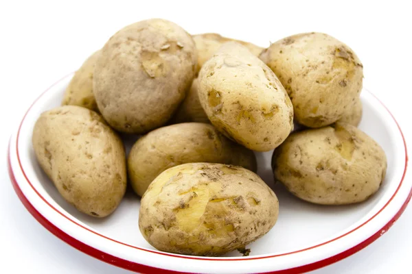 Patatas marrones cocidas en plato —  Fotos de Stock