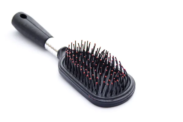 Escova de cabelo preta para cuidados com o cabelo — Fotografia de Stock