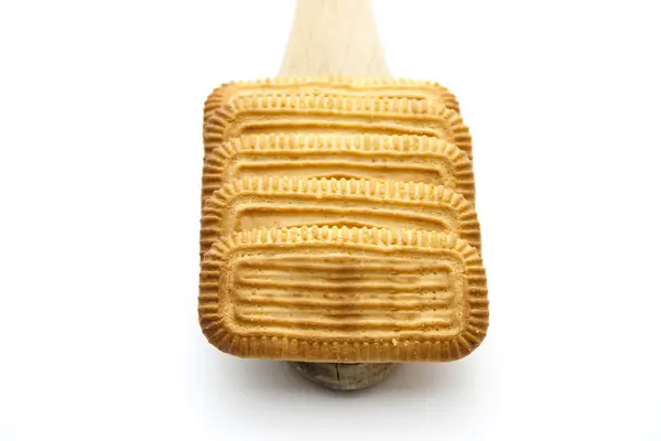 Ψημένα μπισκότα σε ξύλινη κουτάλα — Φωτογραφία Αρχείου
