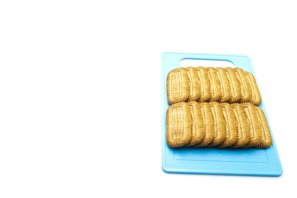 Biscotti appena sfornati su piatto blu — Foto Stock