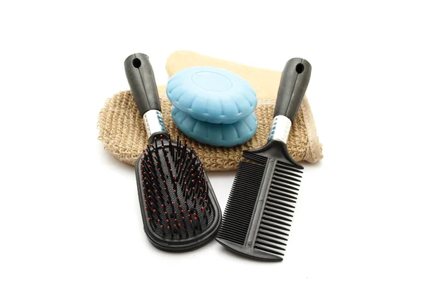 Gant de massage avec peigne en plastique et savon bleu — Photo