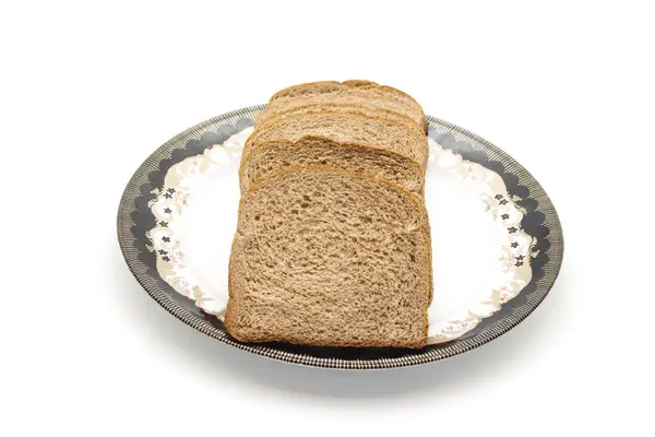 Pão de torrada marrom assado fresco na placa — Fotografia de Stock