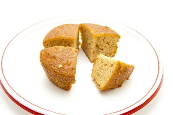 Fresh Baked Cake on Plastic Plate — Stock Photo, Image