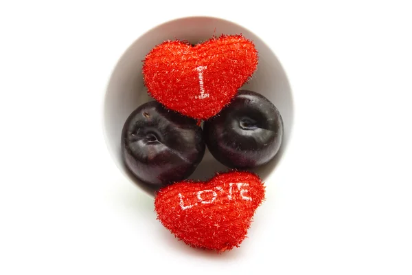 Fresh Dark Plums with Red Hearts — Stock Photo, Image