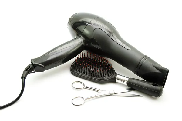 Beyaz zemin üzerinde saç fırçası ile saç kurutma makinesi — Stok fotoğraf