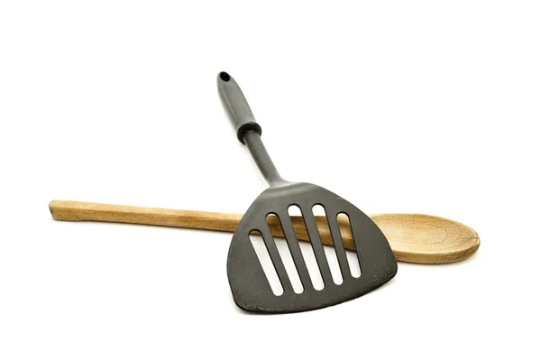 Black Spatula with Wooden Cooking Spoon on white background — Stock Photo, Image