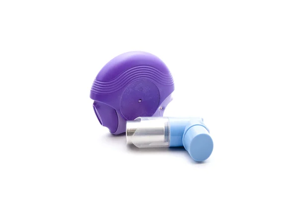 Asthma-Inhalator auf weißem Hintergrund lizenzfreie Stockfotos