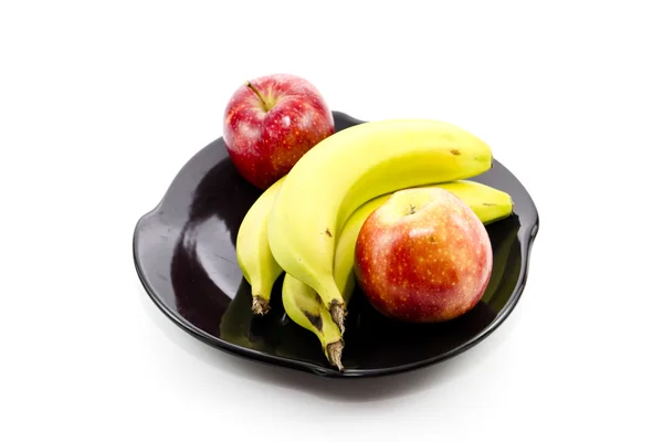 Manzanas rojas frescas con plátanos amarillos —  Fotos de Stock