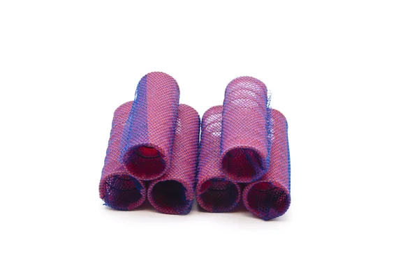 beyaz zemin üzerine kırmızı saç kıvırıcı