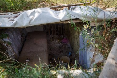 Andriyivka, Buchansky bölgesi, Kyiv bölgesi, Ukrayna; Rusya Ukrayna savaşı; Andriyivvka 'da çatışmadan sonra hasar gördü