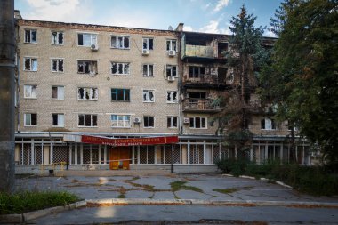 Izium, Kharkiv region, Ukraine - 09.22.2022: Destruction of Izium. Russia Ukraine war. Damaged in Izium after fighting clipart