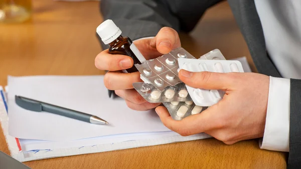 Pills abuse in business — Stock Photo, Image