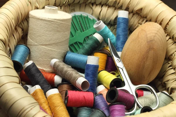 Colored threads and sewing accessories — Stock Photo, Image