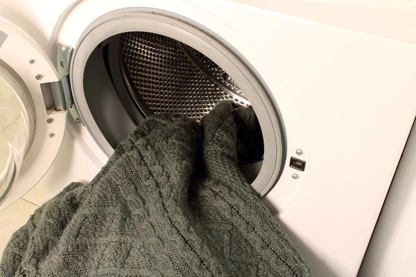 Washing machine and sweater — Stock Photo, Image