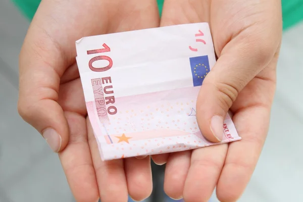 Geld in der Hand — Stockfoto