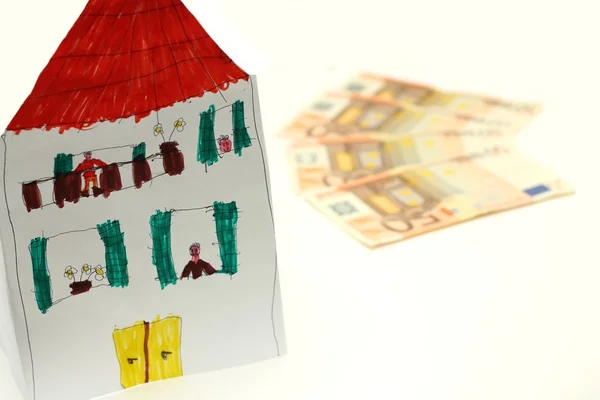 Dinero y casa — Foto de Stock